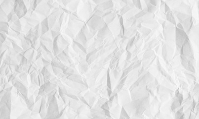 White crumpled paper sheet background. Blank creased paper texture.