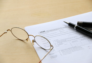 Fototapeta premium Tax Return 1040 paper on table