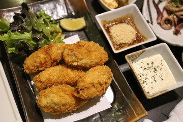 deep fried perna viridis, Japanese style with sauce