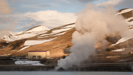 Steaming Geo-Thermal Station Across A Frozen Lake At Myvatn, Iceland
