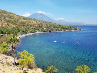 Fototapeta premium City of Amed with Mount Agung in the background - Bali