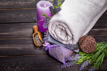 Obraz na płótnie Canvas Lavender spa setting. Wellness theme with lavender products.