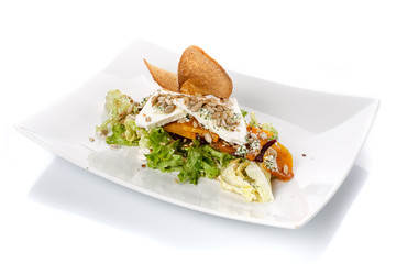 Restaurant food. Salad in a plate. Delicious food.