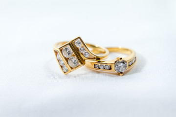 Diamond engagement gold ring with white isolated background