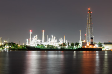 Oil refinery at night with lighting  beautiful in Bangkok Thailand