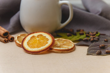 Cocoa or latte or hot chocolate with cinnamon. On a bright wooden background.