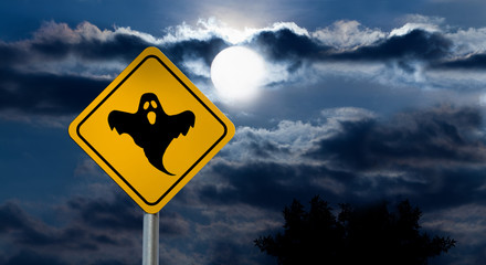 Full Moon in the Night Sky and Halloween Road Sign - Ghost