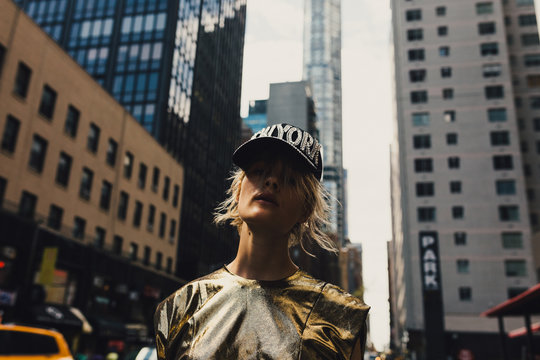 Beautiful Woman Stand Out With Her Golden Dress On the Streets of Manhattan NY