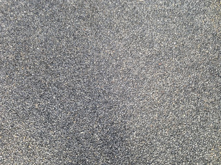 asphalt textured background of black fine-grained stones. stock vector illustration eps10 - obrazy, fototapety, plakaty
