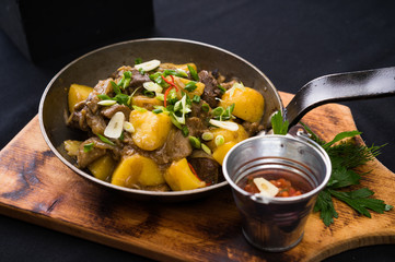 freshly cooked meat and potatoes