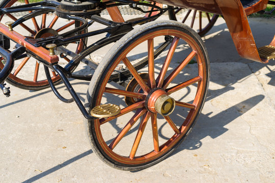 wheel of a wooden coach
