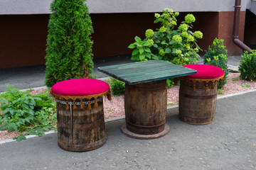 table and chairs from wooden barrels