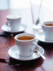 Espresso coffee cups on table