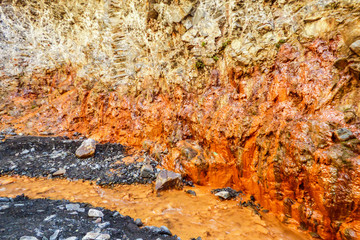 Gorge with orange rocks (due to high level of iron) at Caldera de Taburiente National Park in La Palma, Canary Islands