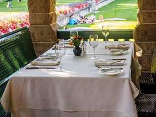 Table set with silverware in a restaurant