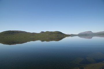 View of the lake Alanen Kilpisjärvi, in the horizon the mountain Saana, summer