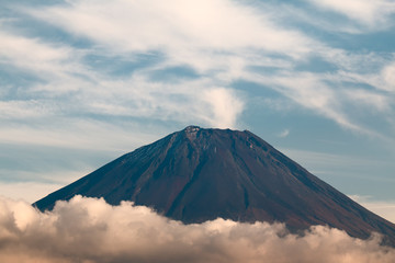 Close up of Mouth crater of Fuji san with cloud around in Autumn season