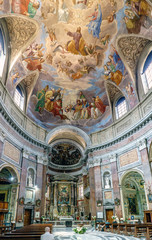 Rome, Lazio, Italy. May 22, 2017: Interior of the Catholic church called "San Giacomo in Augusta" famous for its painted polychrome frescoes in the dome
