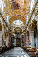 Fototapeta na wymiar Rome, Lazio, Italy. May 22, 2017: Main nave and main altar of the Catholic church called 