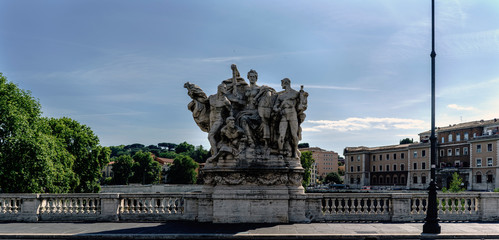 Obraz premium Rome, Lazio, Italy. July 25, 2017: Detail of statue located on the parapet of the bridge of San Angelo on the river Tiber with a clear sky