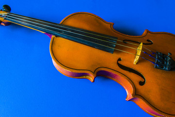 A violin on a blue background