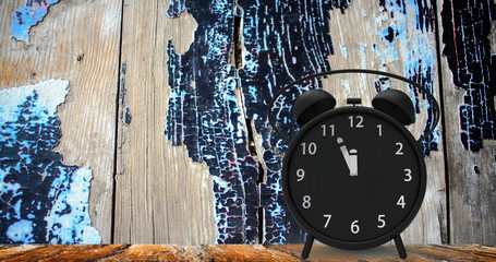 3d rendering of alarm clock with little minutes to twelve o'clock
