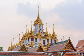 Golden Castle in public park/Golden pagoda in Wat Ratcha Nadda Temple 