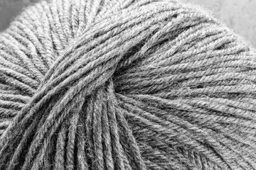 A ball of woolen yarn.- in black and white.