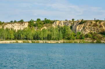 Fototapeta na wymiar Beautiful quarry with water. Water reservoir in Trzebinia, Poland.