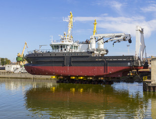 Fototapeta premium The big boat is ready for launch in the water