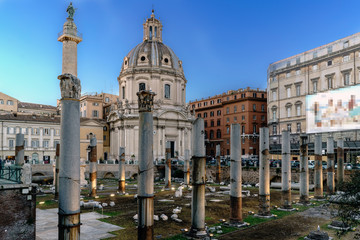 Fototapeta na wymiar Panoramic view of the ruins of the Trajan's Forum and the Catholic Church called 
