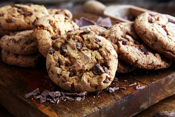 Chocolate cookies on wooden table. Chocolate chip cookies shot