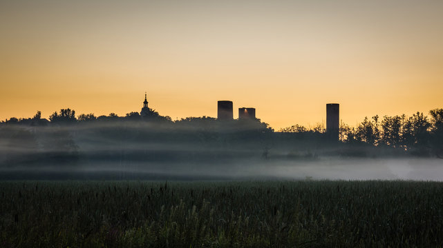Sunrise during the fog over the castle  in Czersk, Poland
