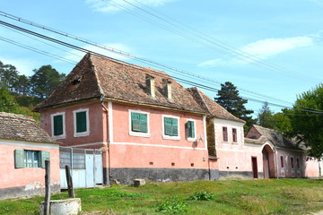 Typical rural landscape and peasant houses in Bradeni, Henndorf, Hegendorf,  Transylvania, Romania....