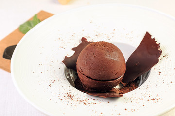 Dark chocolate cake white plate