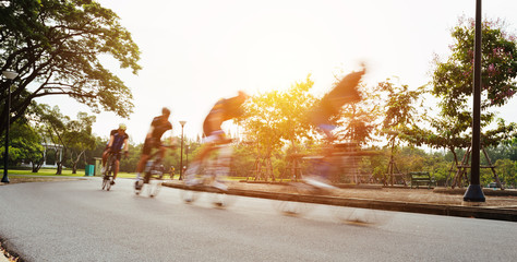 Blurred Speed Cycling Recreation in The Park - Sport and Lifestyle Concept