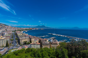 Naklejka na ściany i meble Naples (Campania, Italy) - The historic center of the biggest city of south Italy. Here in particular: the landscape from Posillipo terrace with Vesuvio and the port