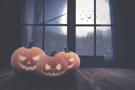 pumpkin's on the wood with window background