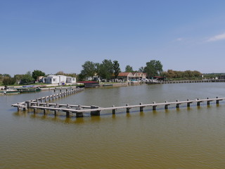Fototapeta premium lavoriero di Stazione Foce nelle Valli di Comacchio
