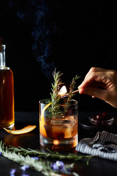 Maple Old Fashion Cocktail Drink with Smoking Rosemary