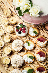 Candy Bar. Delicious sweet buffet with cupcakes. Sweet holiday buffet with cupcakes and other desserts.Table with sweets, candies, dessert,happy birthday concept