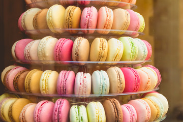 appetizing macarons multicolor in the shop window