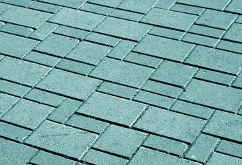 Cyan color pavement pattern with blur effect.