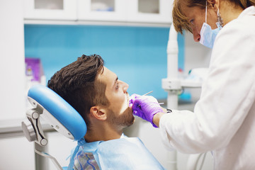 Young Man At The Dentist