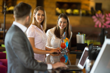 Young business people havinh fun in cafe