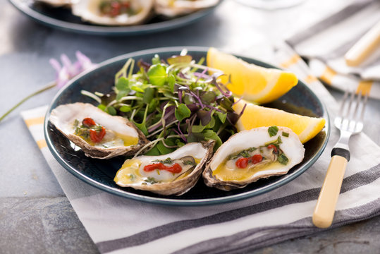 Grilled Oysters with Herb Butter Sauce