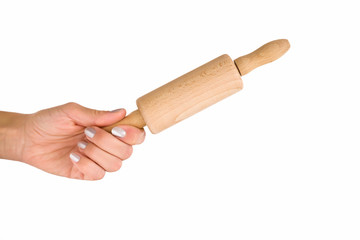 Woman's hand holding a rolling pin isolated on the white background. Preparing food.