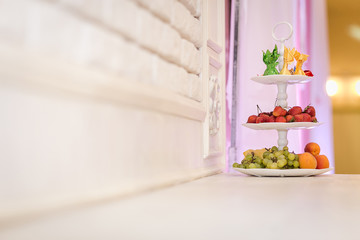 Candy Bar. Delicious sweet buffet with cupcakes. Sweet holiday buffet with cupcakes and other desserts.Table with sweets, candies, dessert,happy birthday concept