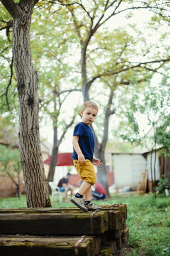 Boy is playing outside