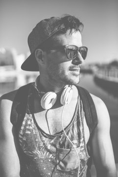 Black and White Portrait of a Young Handsome Man in a Sunny Day
